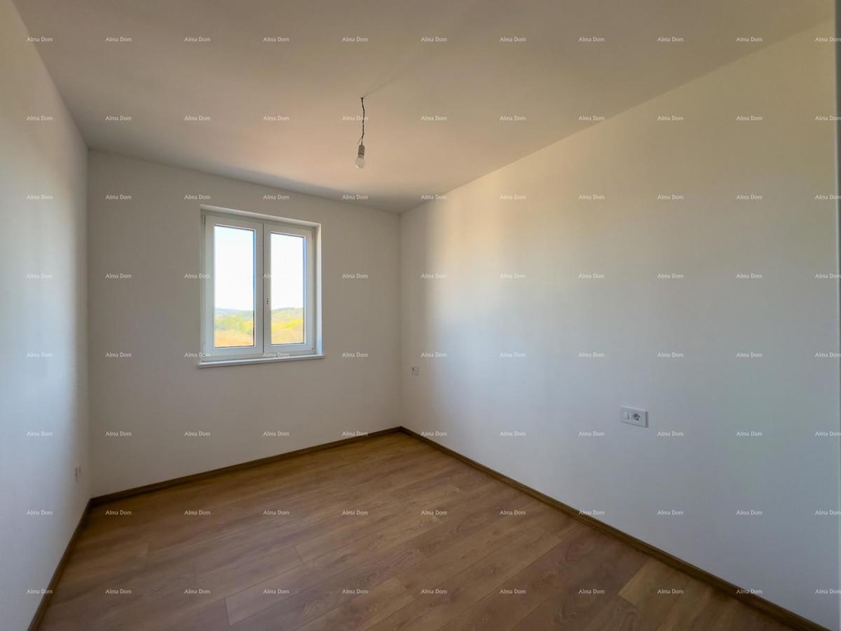 Vendiamo un appartamento con un grande giardino a Barban.