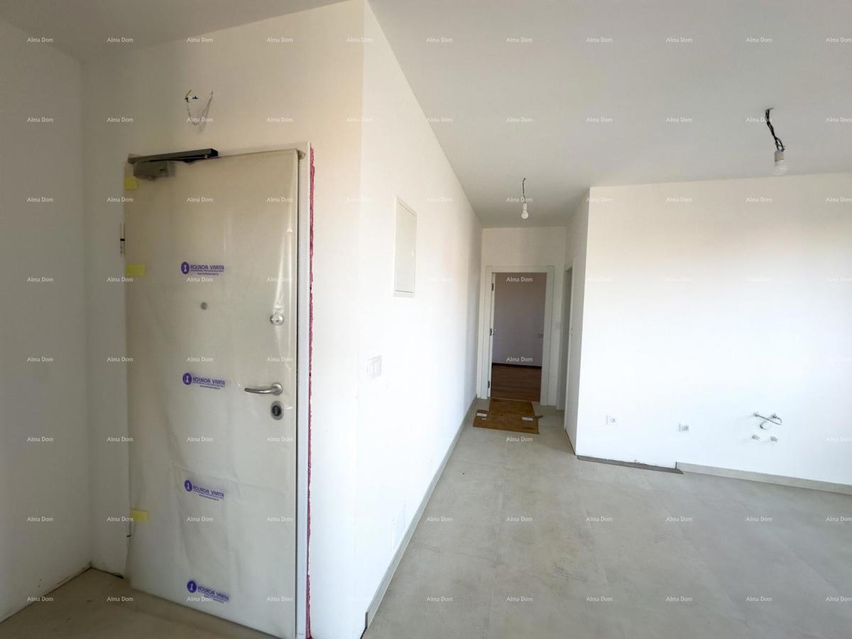 Vendiamo un appartamento con un grande giardino a Barban.