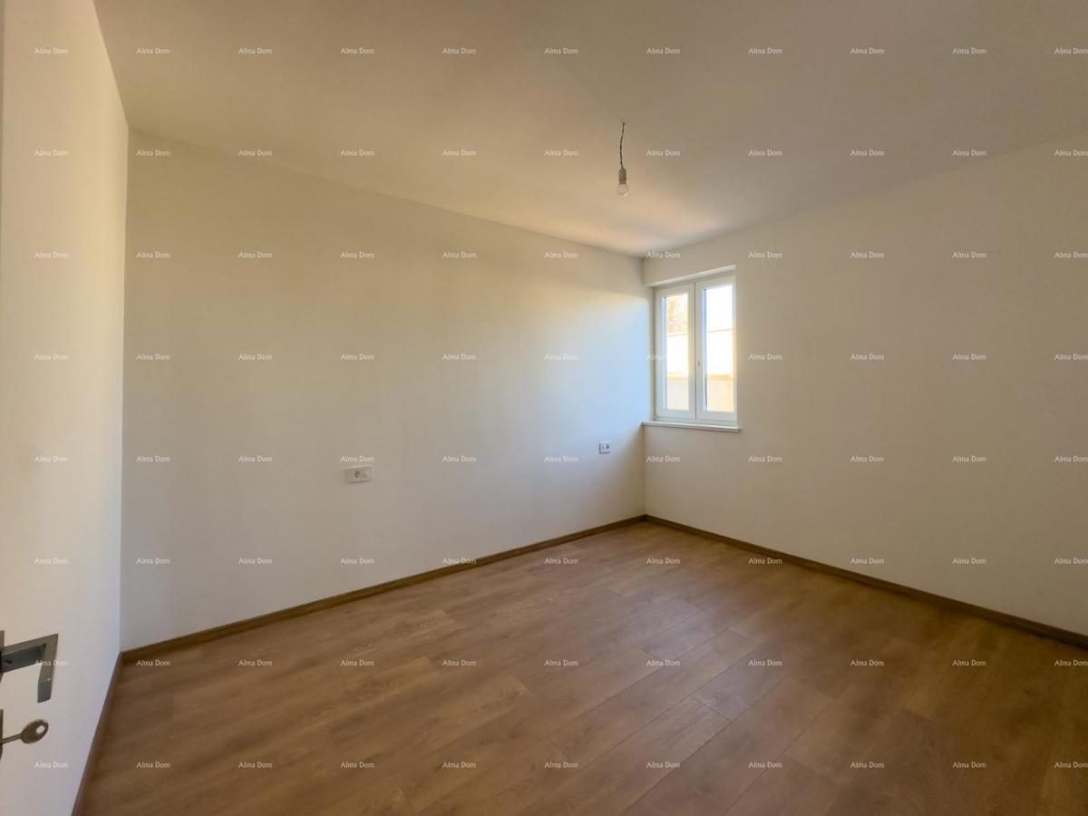 Vendiamo un appartamento con un grande giardino a Barban.