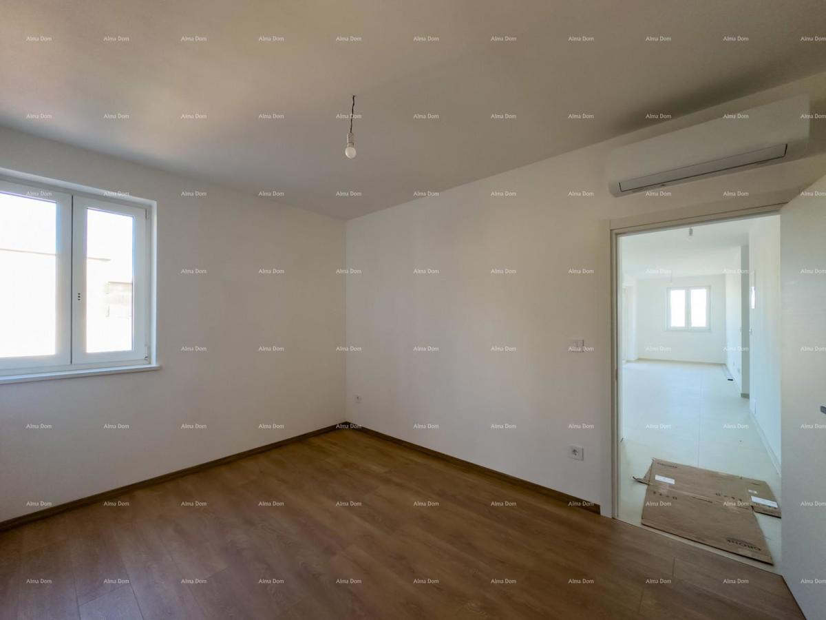 Vendiamo un appartamento con un grande giardino a Barban.