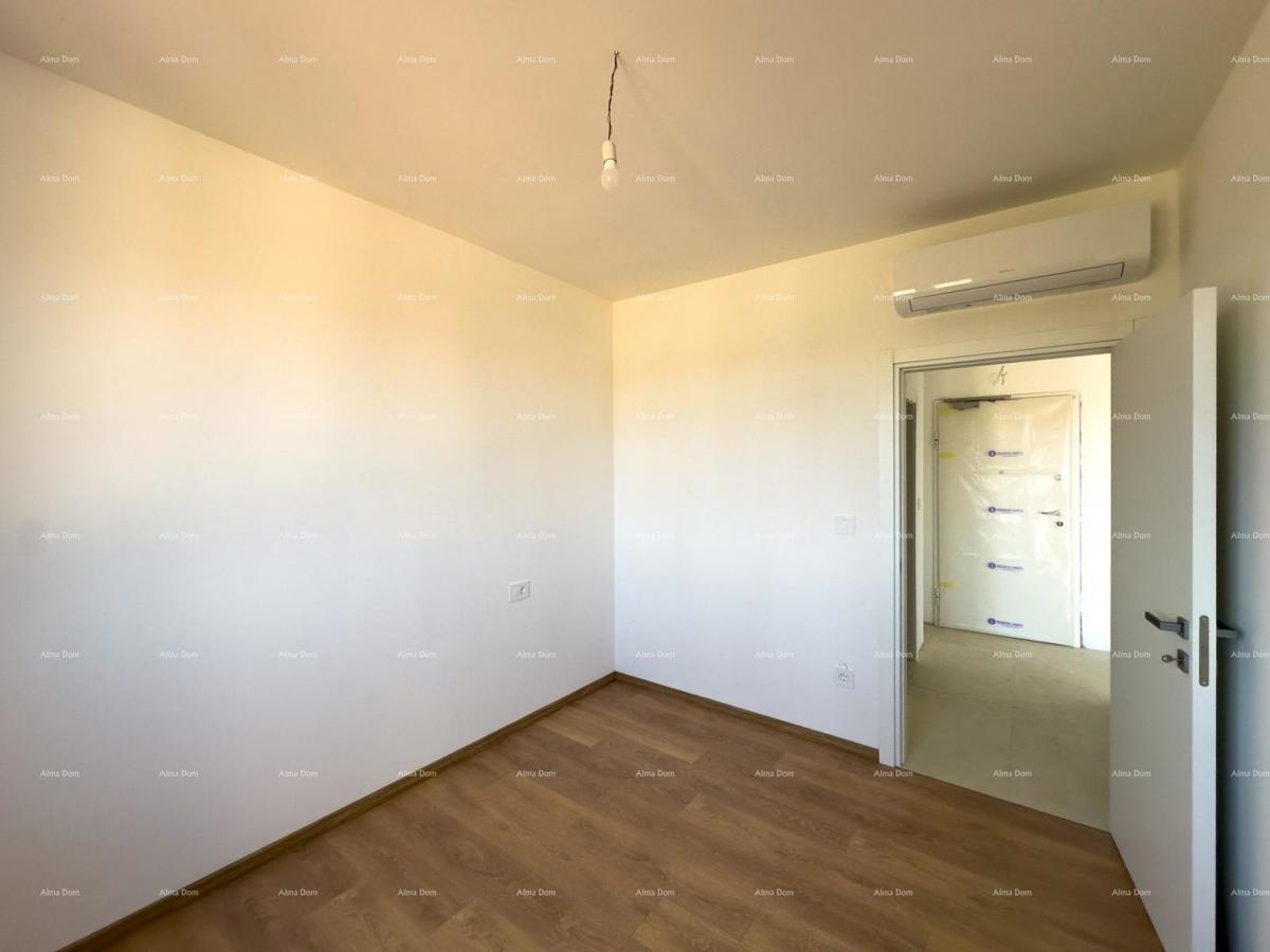 Vendiamo un appartamento con un grande giardino a Barban.