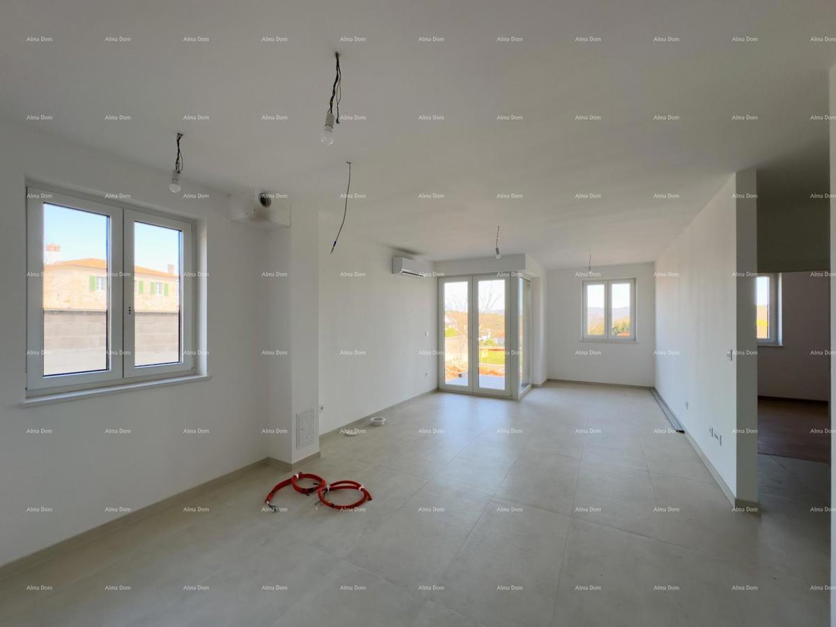 Vendiamo un appartamento con un grande giardino a Barban.