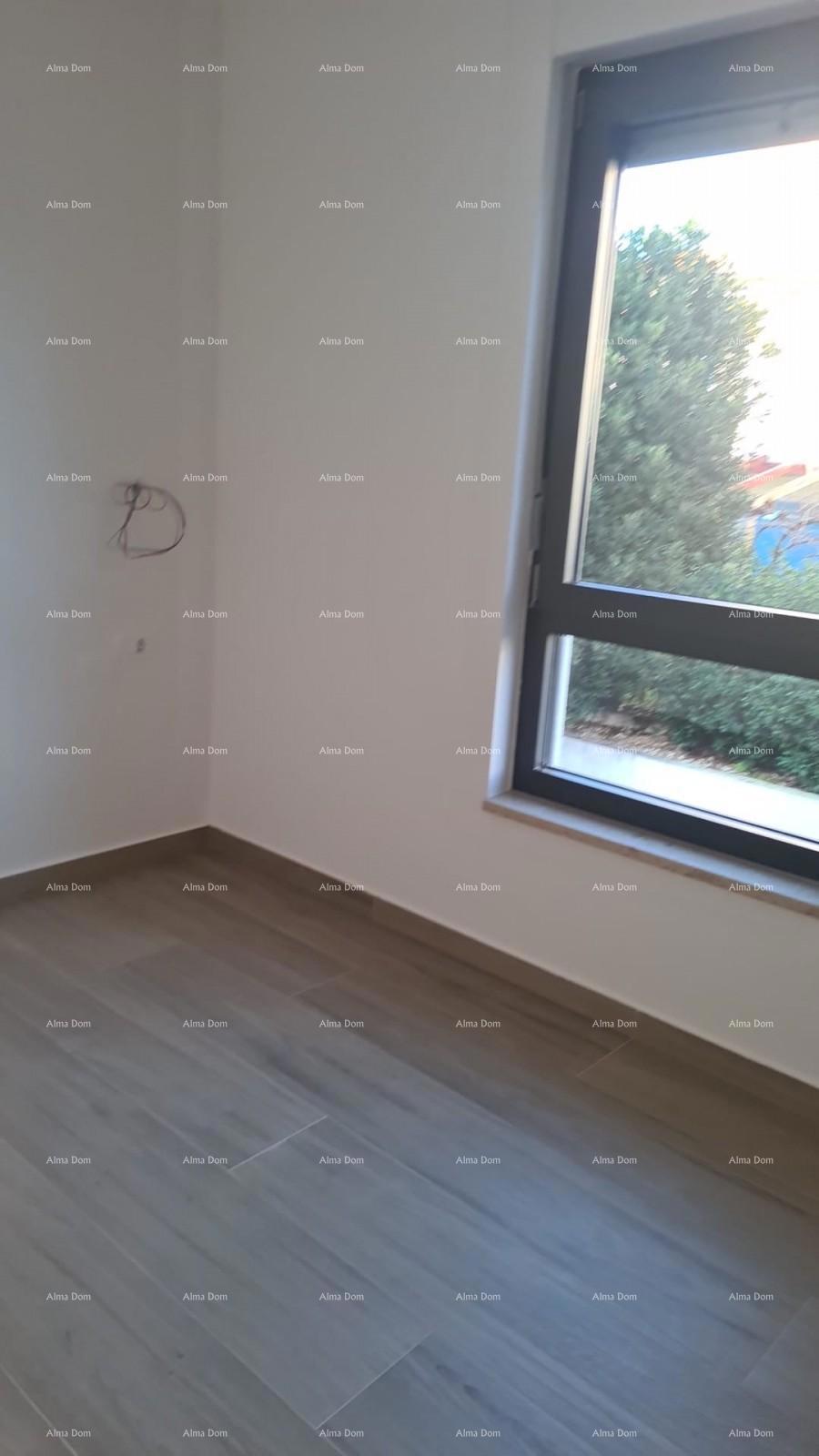 Appartamento moderno nel blocco A con giardino e posto auto, vicinanza a Umago!