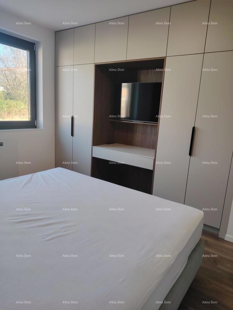 Eccellente appartamento trilocale con giardino e piscina, arredato