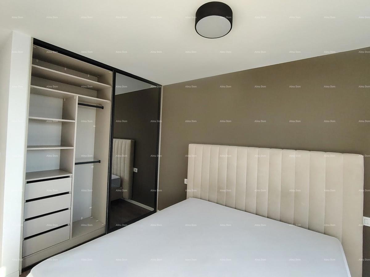 Eccellente appartamento trilocale con giardino e piscina, arredato