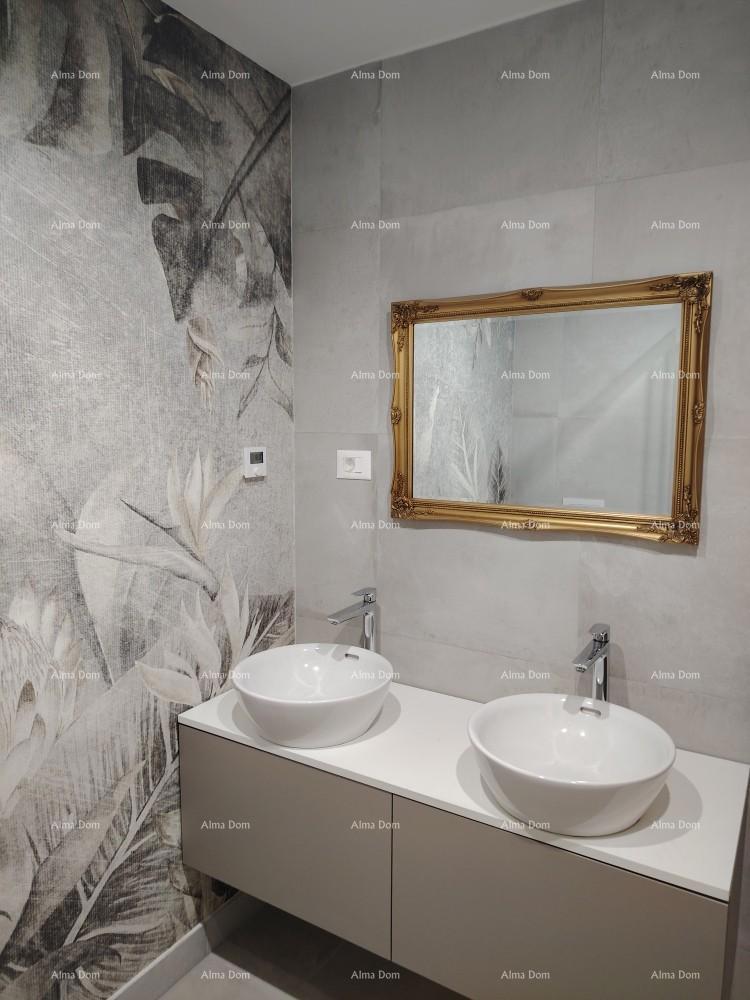 Eccellente appartamento trilocale con giardino e piscina, arredato