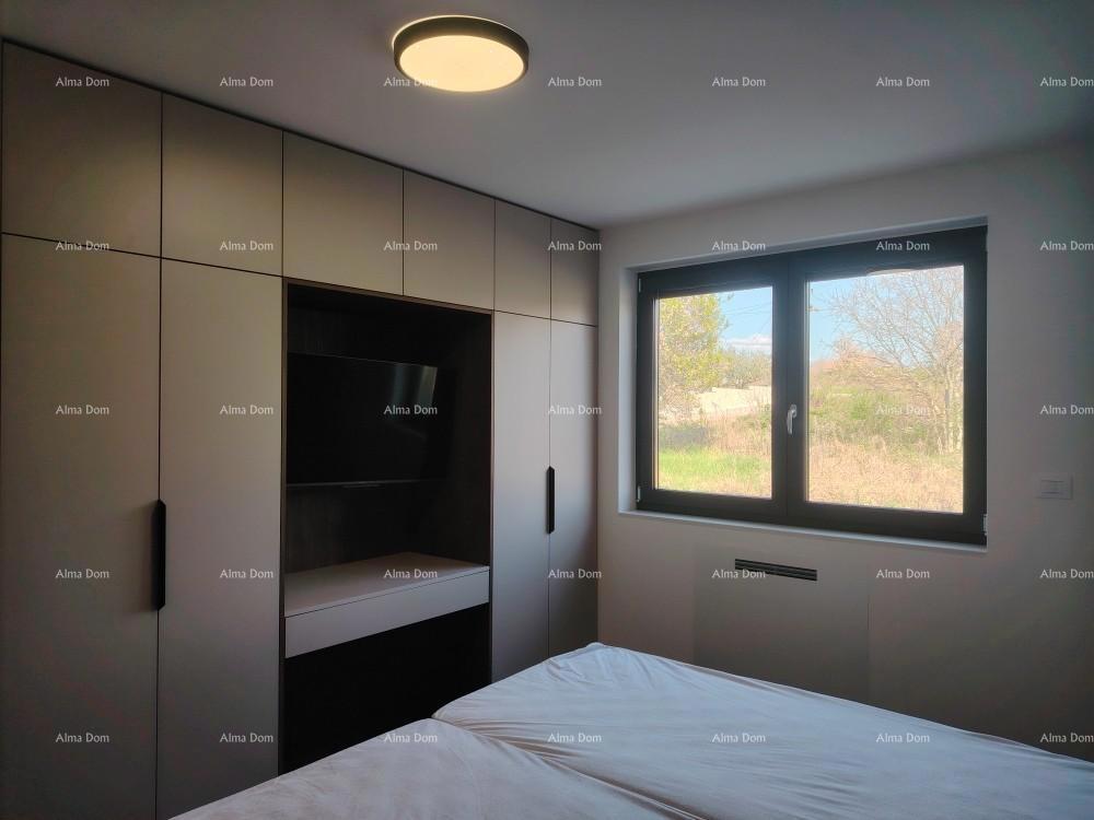 Eccellente appartamento trilocale con giardino e piscina, arredato