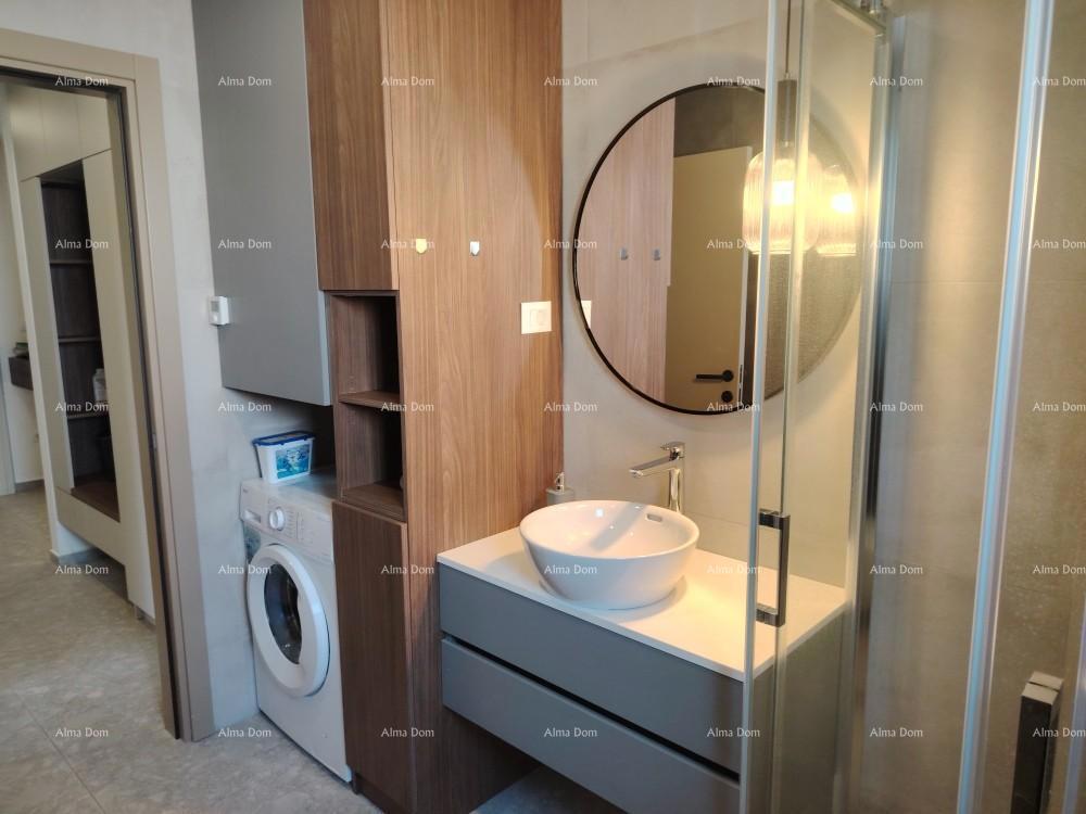 Eccellente appartamento trilocale con giardino e piscina, arredato