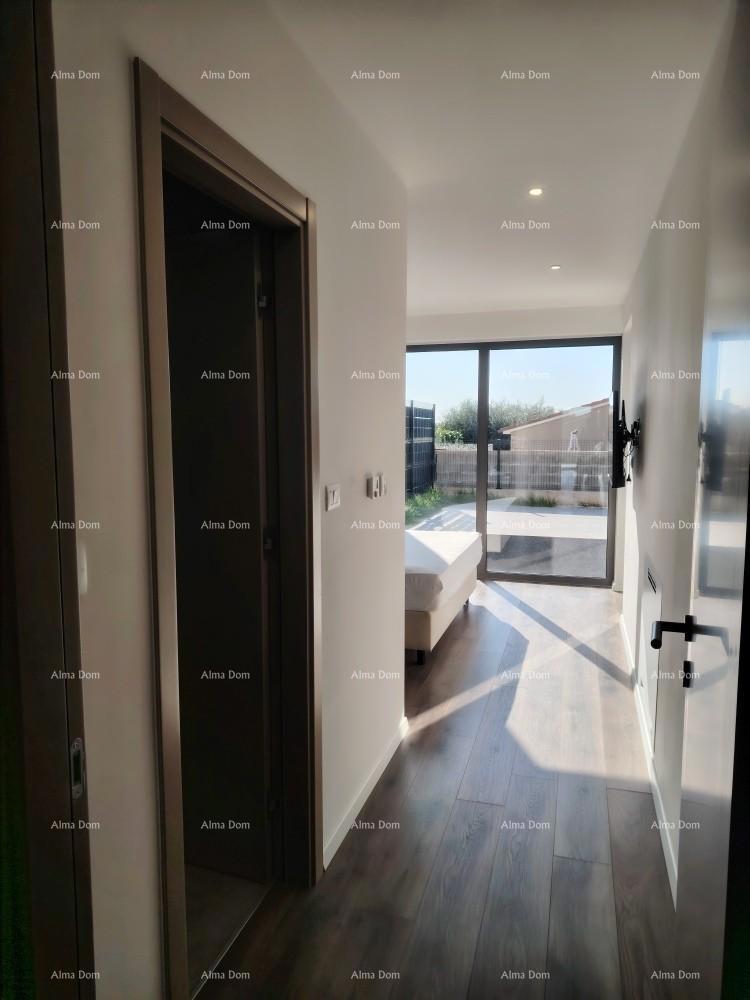 Eccellente appartamento trilocale con giardino e piscina, arredato