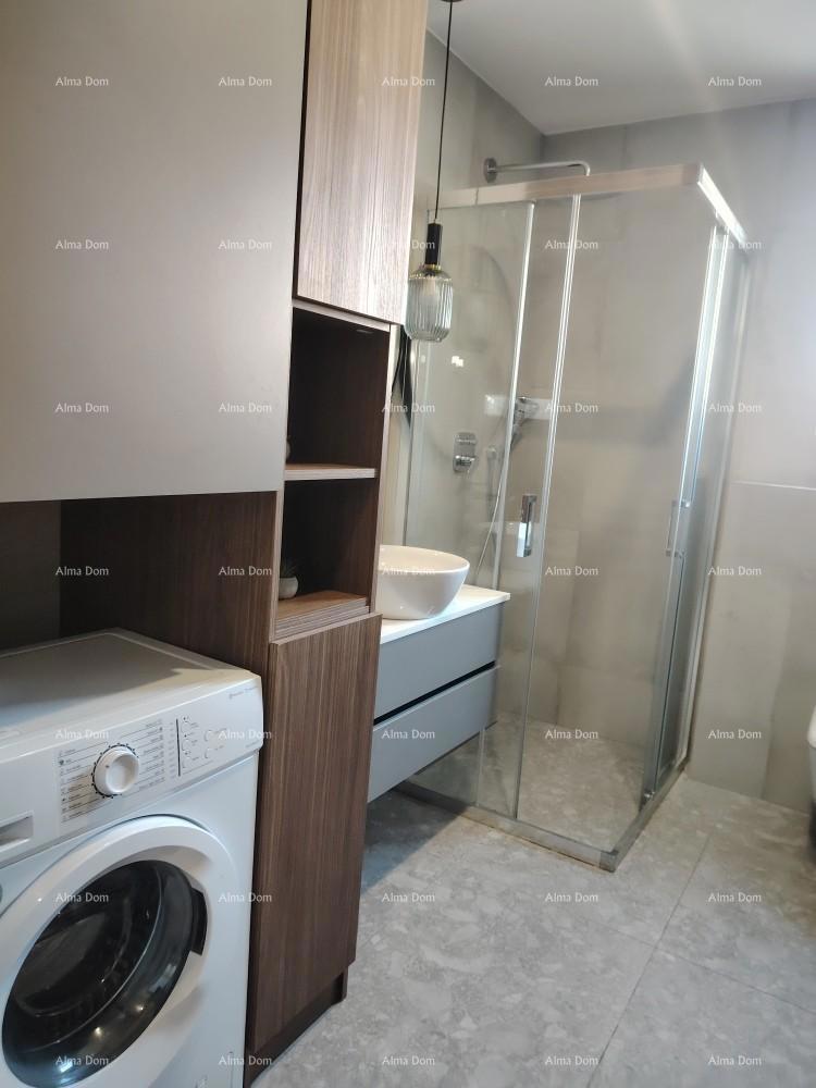 Eccellente appartamento trilocale con giardino e piscina, arredato