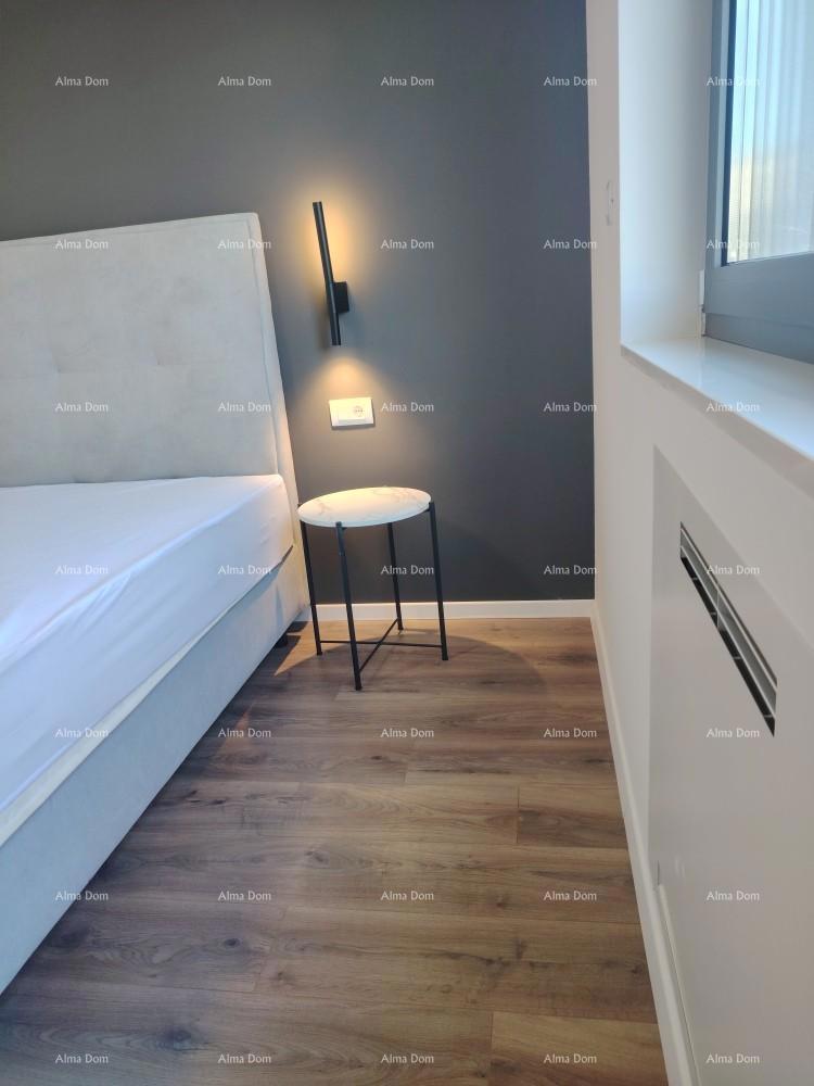 Eccellente appartamento trilocale con giardino e piscina, arredato