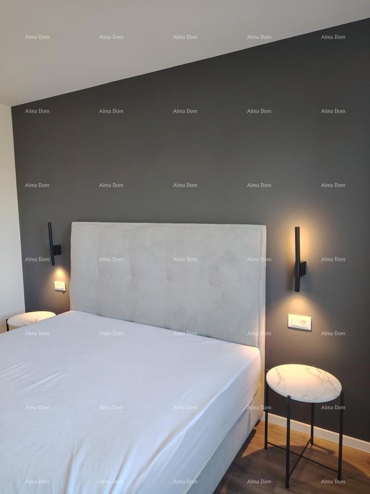 Eccellente appartamento trilocale con giardino e piscina, arredato