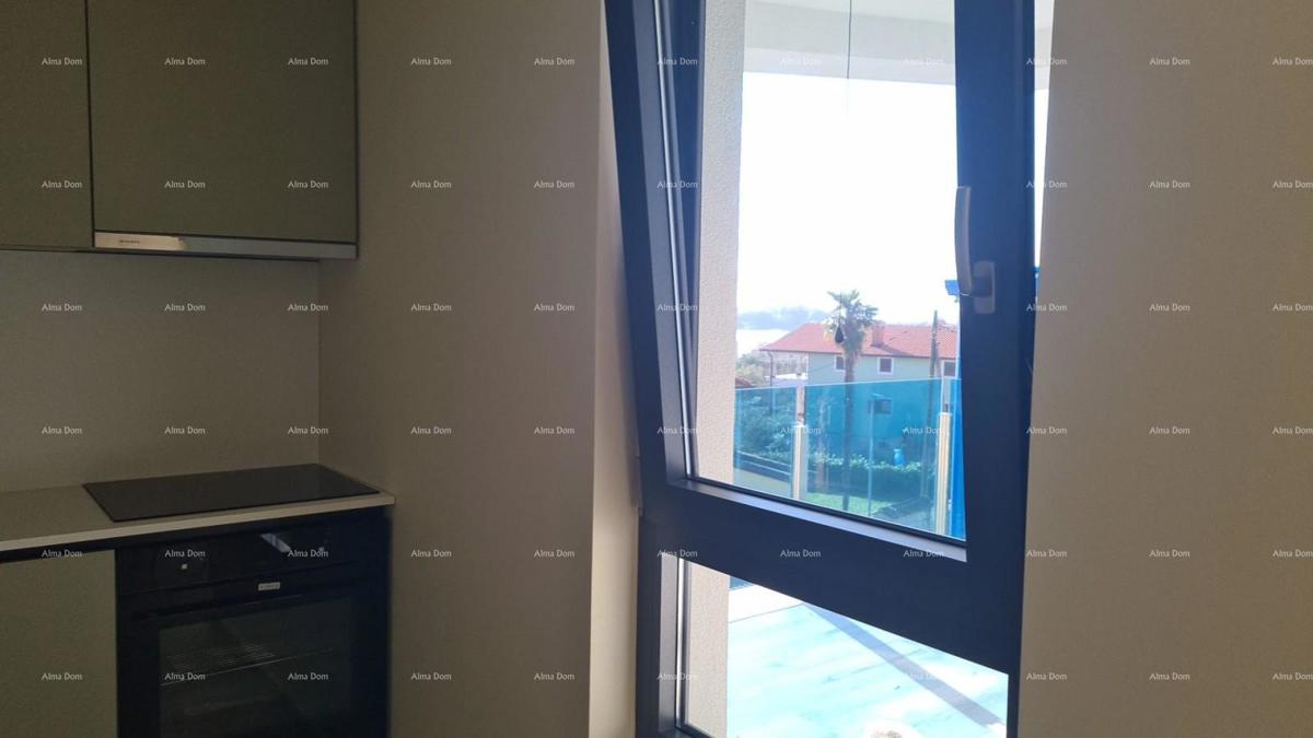 Appartamento moderno con posto auto e ripostiglio nel blocco F, vicino a Umago!