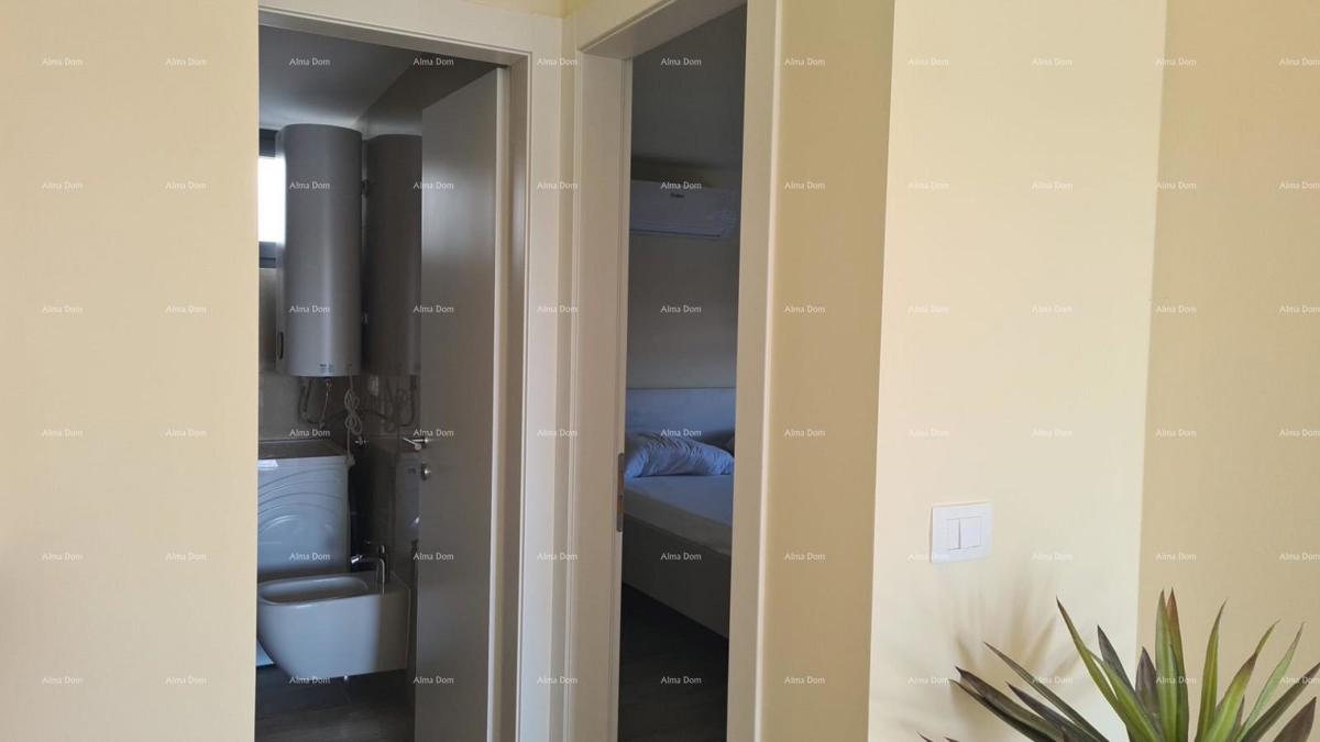 Appartamento moderno con posto auto e ripostiglio nel blocco F, vicino a Umago!