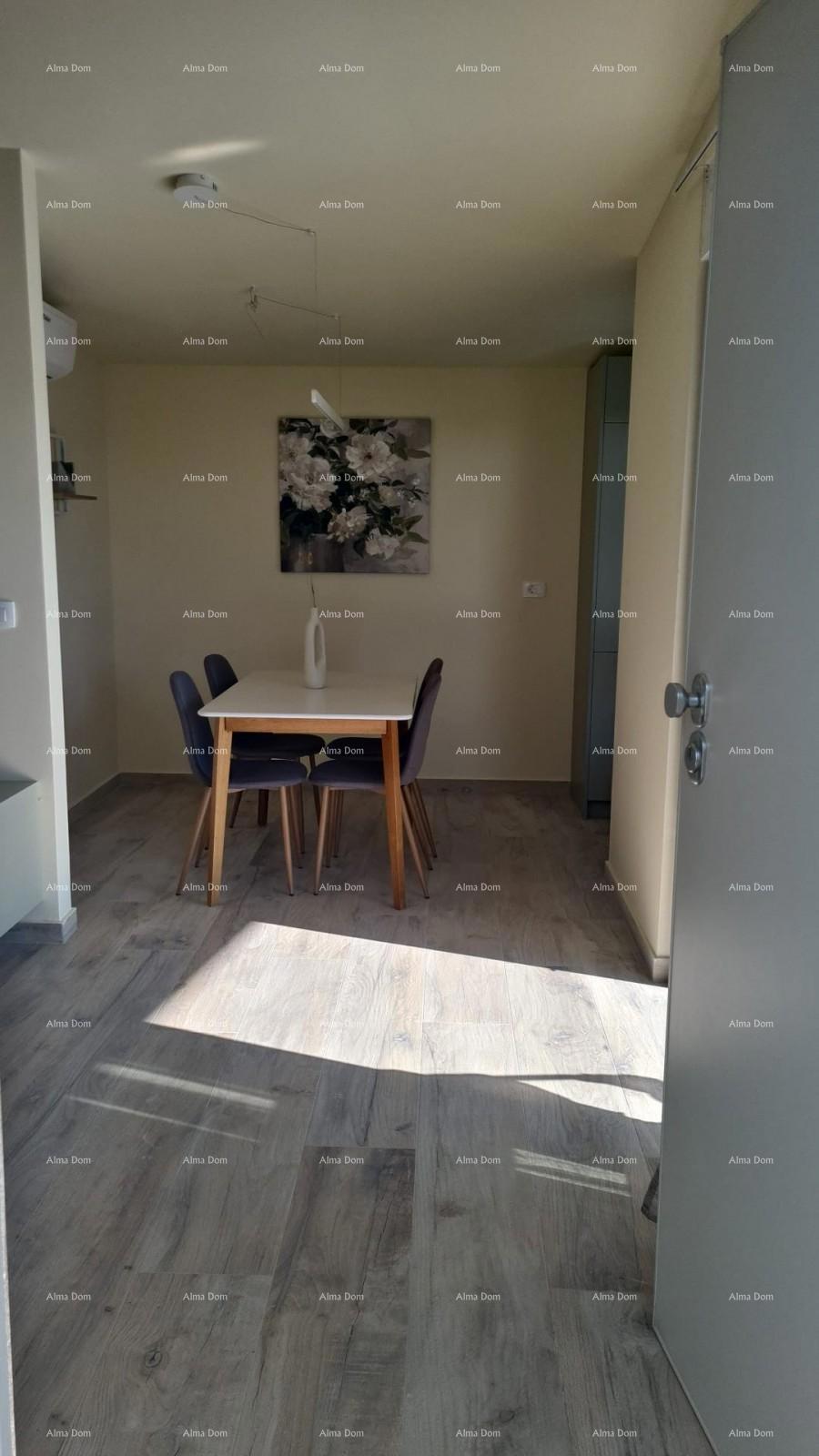 Appartamento moderno con posto auto e ripostiglio nel blocco F, vicino a Umago!