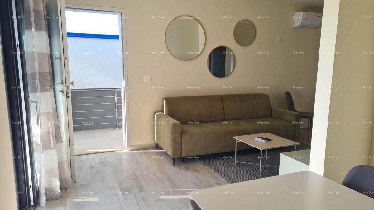 Appartamento moderno con posto auto e ripostiglio nel blocco F, vicino a Umago!