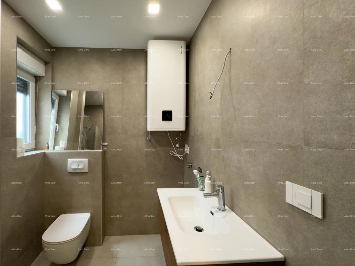 Moderno e arredato appartamento in nuova costruzione, Štinjan, Pula / Permesso di abitabilità