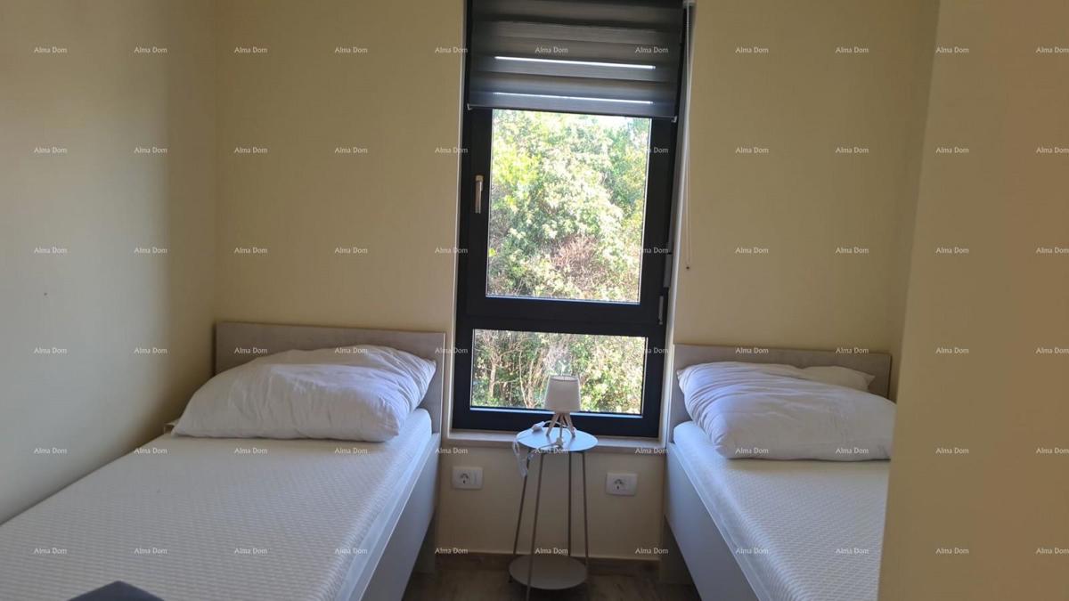 Appartamento moderno nel blocco F, con due posti auto e ripostiglio, vicino a Umago! F2