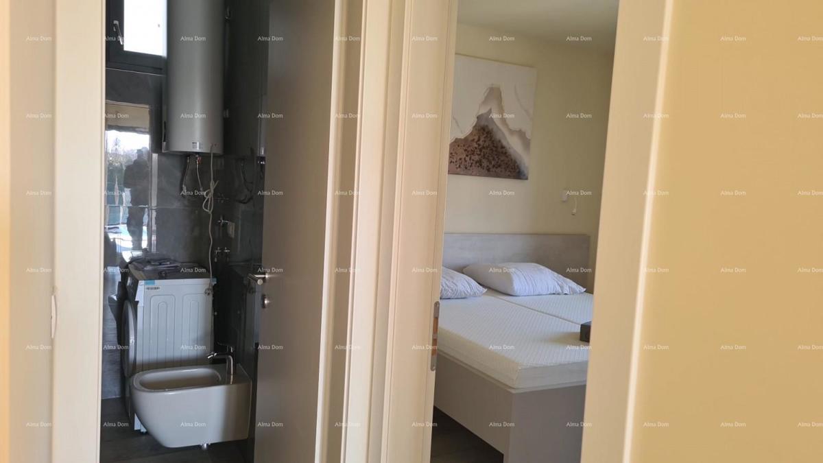 Appartamento moderno nel blocco F, con due posti auto e ripostiglio, vicino a Umago! F2