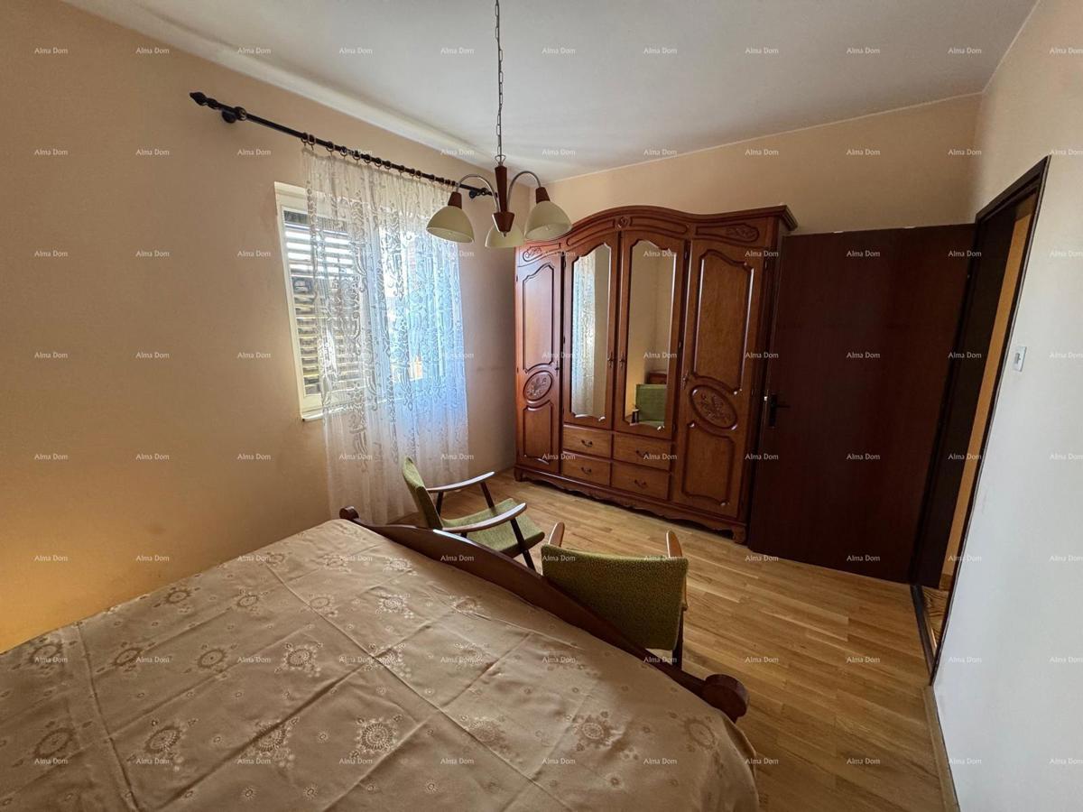 Casa nel centro di Marčana con 2 appartamenti, cantina e laboratorio