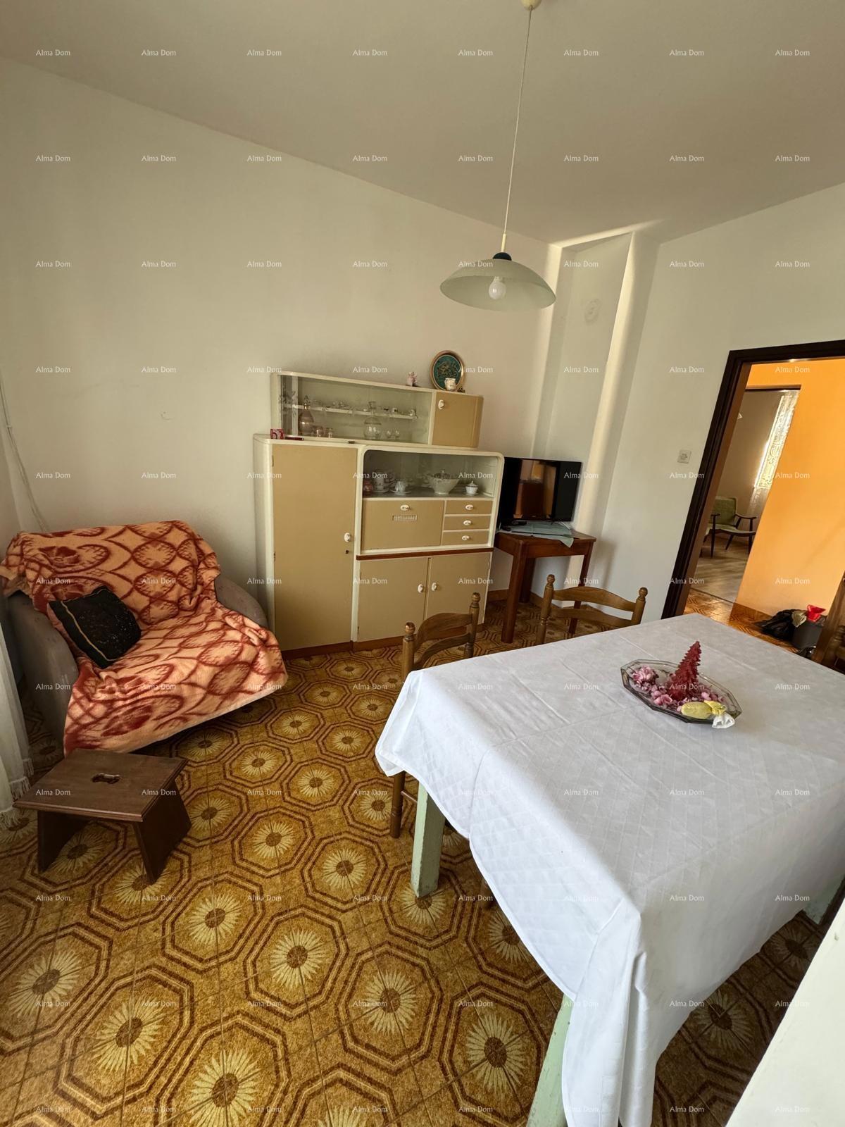 Casa nel centro di Marčana con 2 appartamenti, cantina e laboratorio