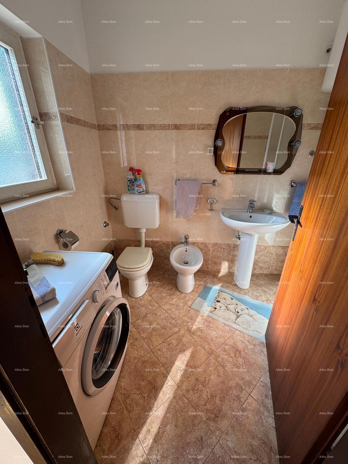 Casa nel centro di Marčana con 2 appartamenti, cantina e laboratorio