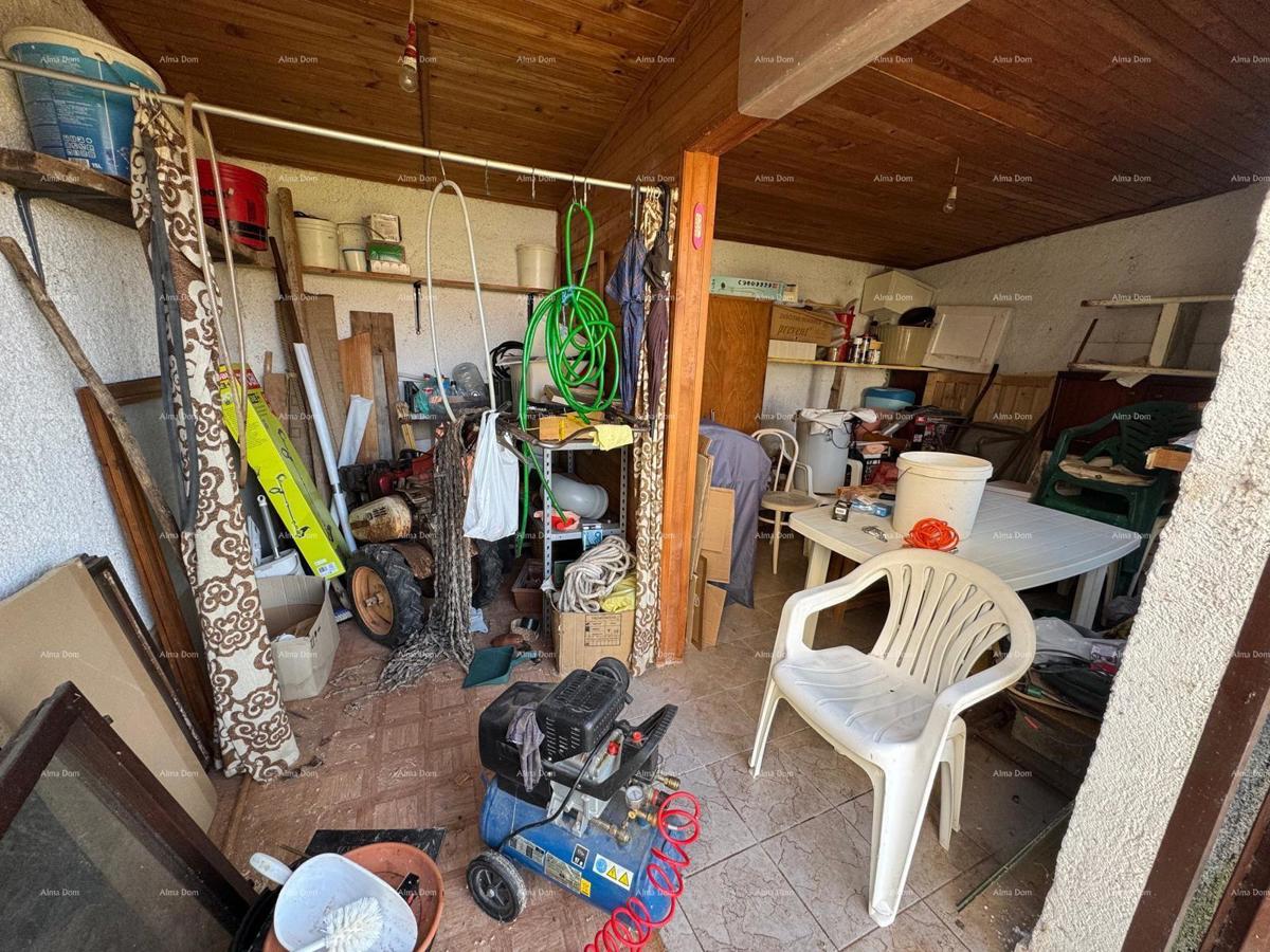 Casa nel centro di Marčana con 2 appartamenti, cantina e laboratorio