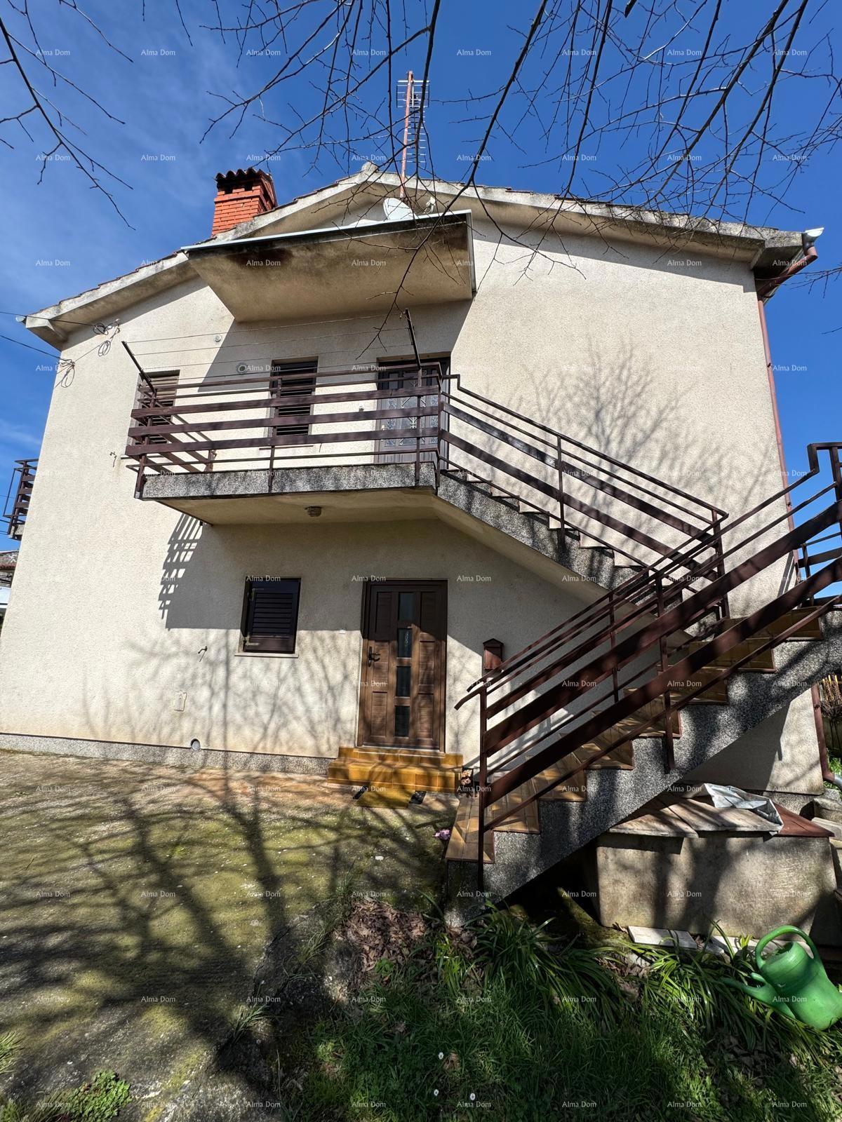 Casa nel centro di Marčana con 2 appartamenti, cantina e laboratorio