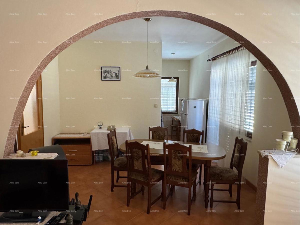 Casa nel centro di Marčana con 2 appartamenti, cantina e laboratorio