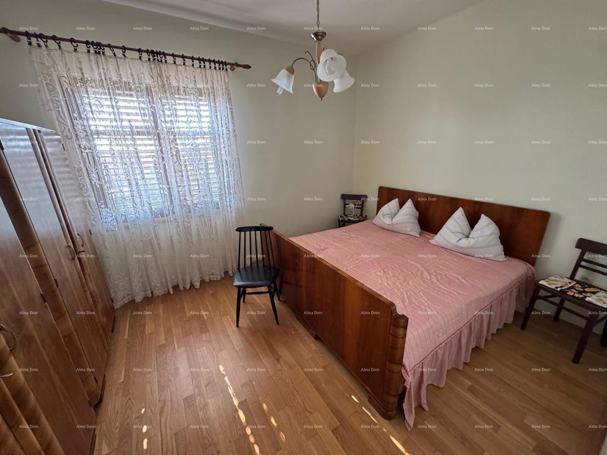 Casa nel centro di Marčana con 2 appartamenti, cantina e laboratorio