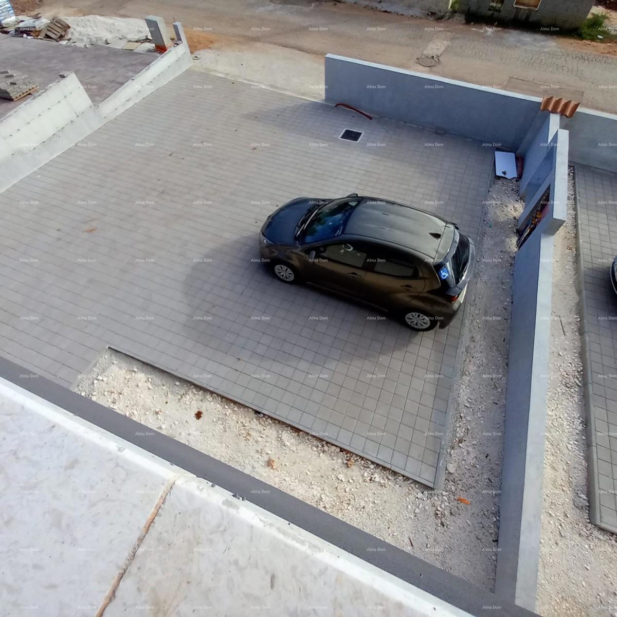 Nuova costruzione! Vendita di un appartamento con due camere da letto e garage. Vicinanza al mare! Medulin!