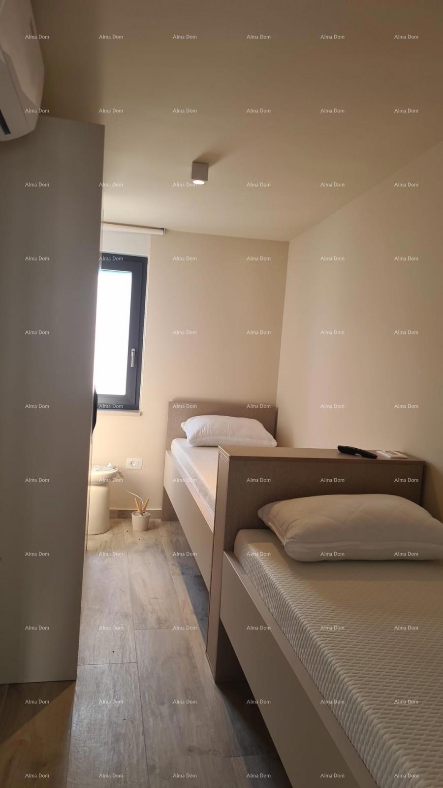 Appartamento moderno nel blocco E con posto auto e ripostiglio, vicino a Umago!