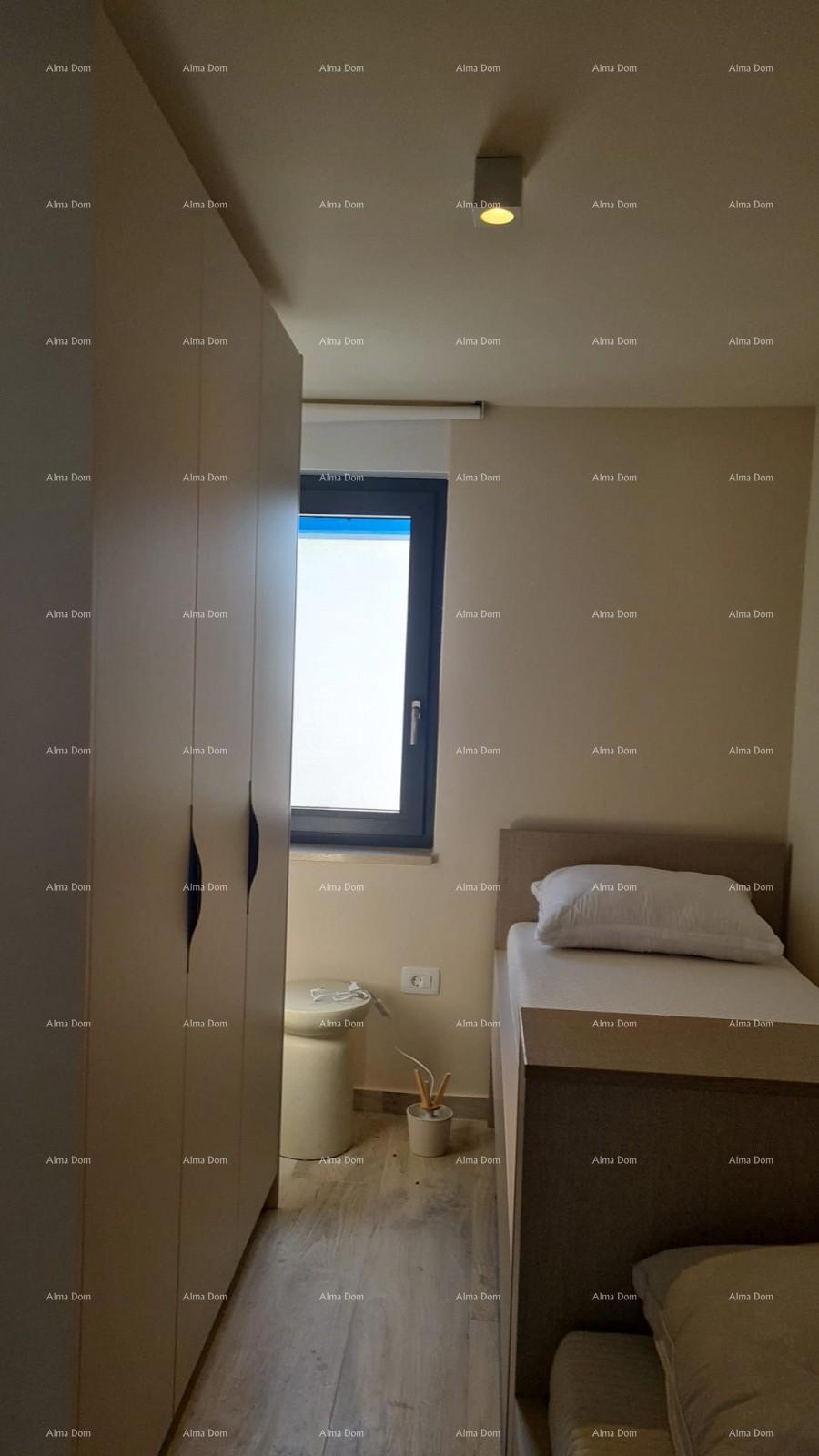 Appartamento moderno nel blocco E con posto auto e ripostiglio, vicino a Umago!