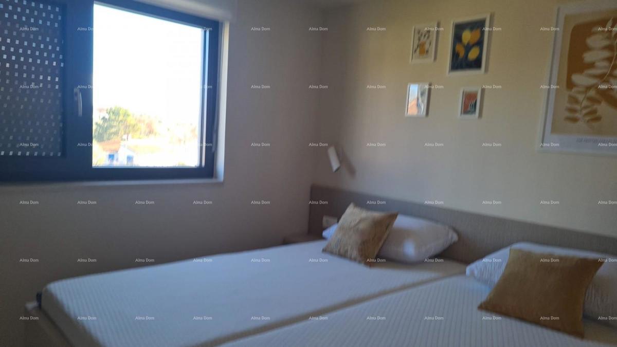 Appartamento moderno nel blocco E con posto auto e ripostiglio, vicino a Umago!