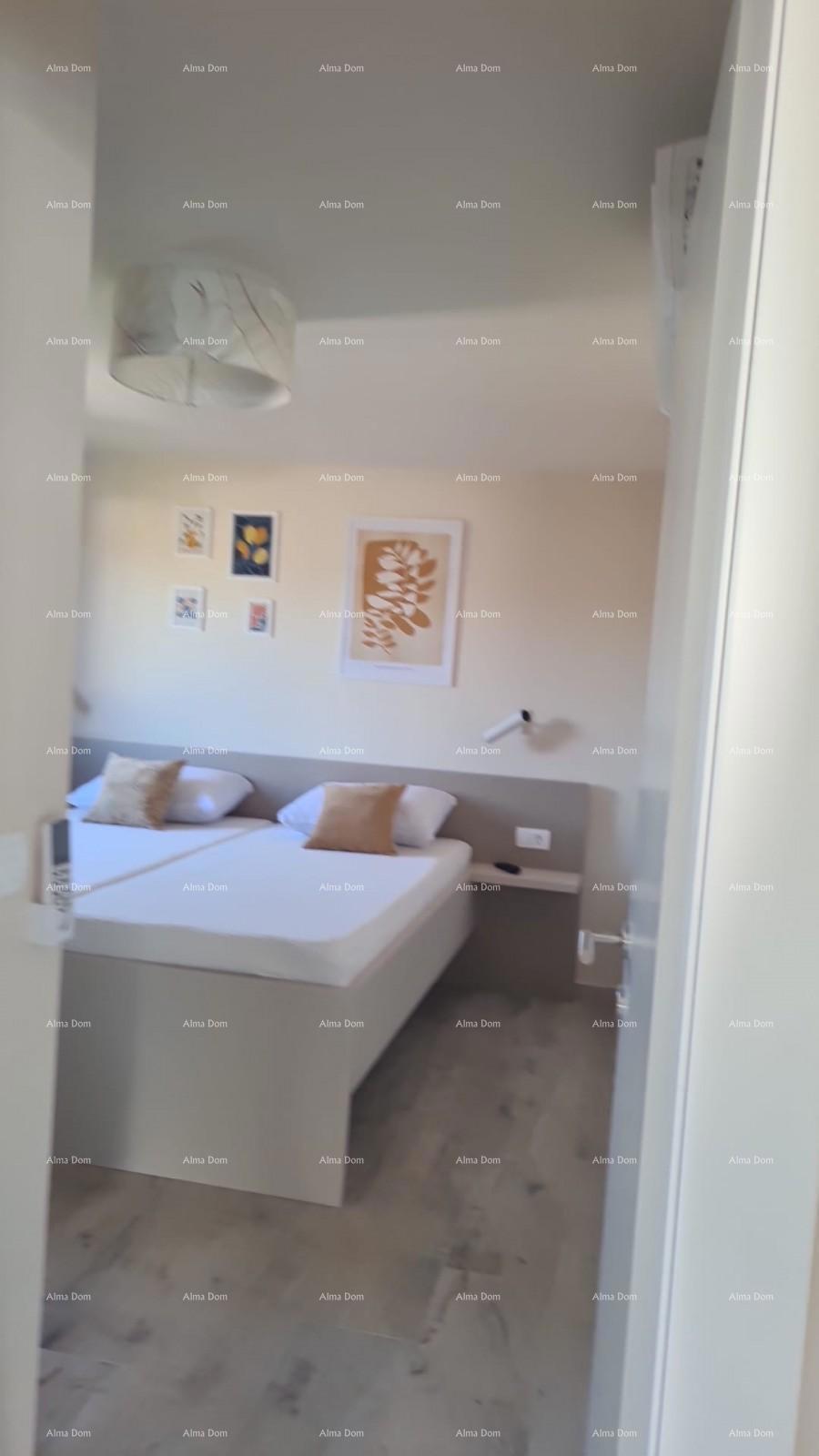 Appartamento moderno nel blocco E con posto auto e ripostiglio, vicino a Umago!