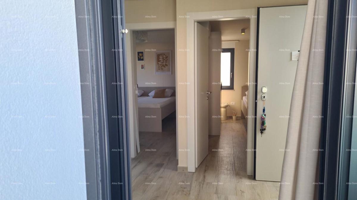 Appartamento moderno nel blocco E con posto auto e ripostiglio, vicino a Umago!