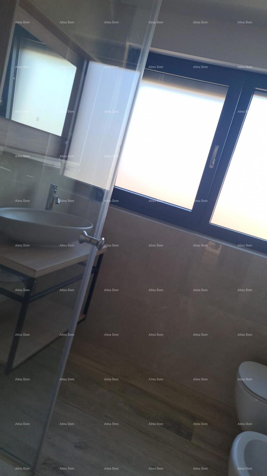 Appartamento moderno nel blocco E con posto auto e ripostiglio, vicino a Umago!