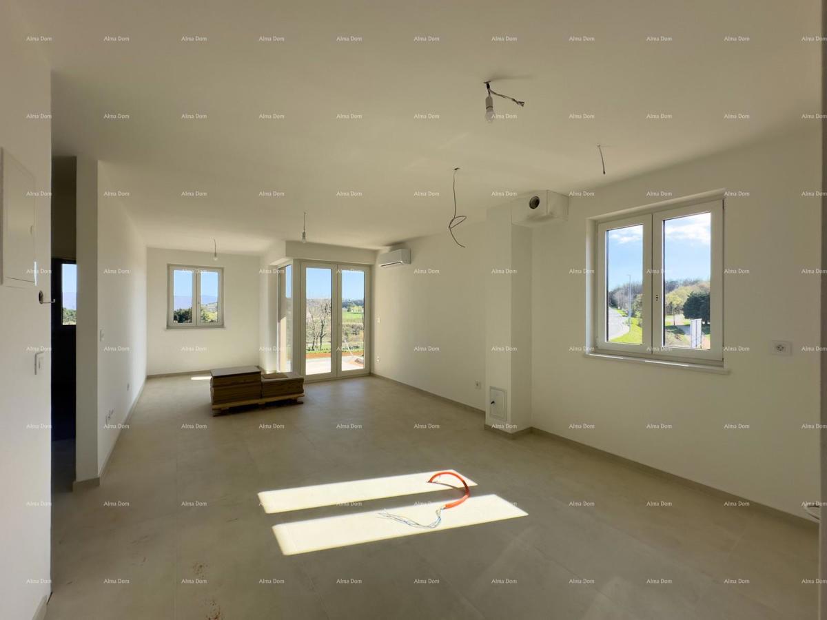 Vendiamo un appartamento con un grande giardino a Barban.