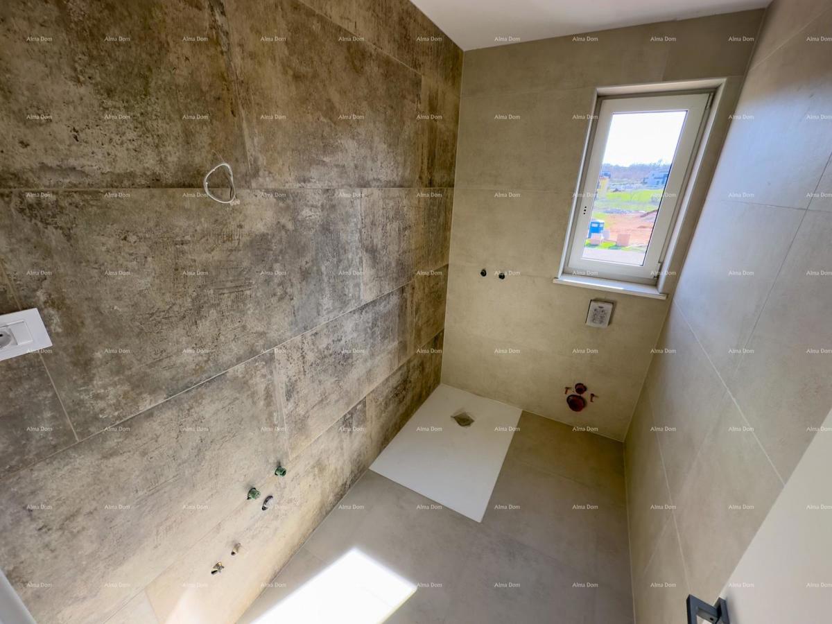 Vendiamo un appartamento con un grande giardino a Barban.