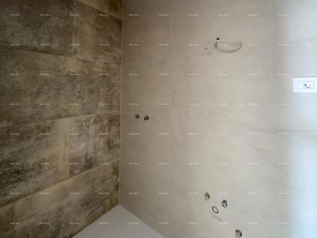 Vendiamo un appartamento con un grande giardino a Barban.