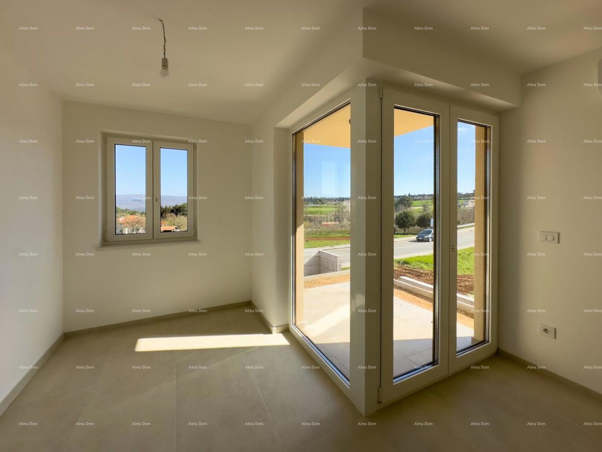 Vendiamo un appartamento con un grande giardino a Barban.