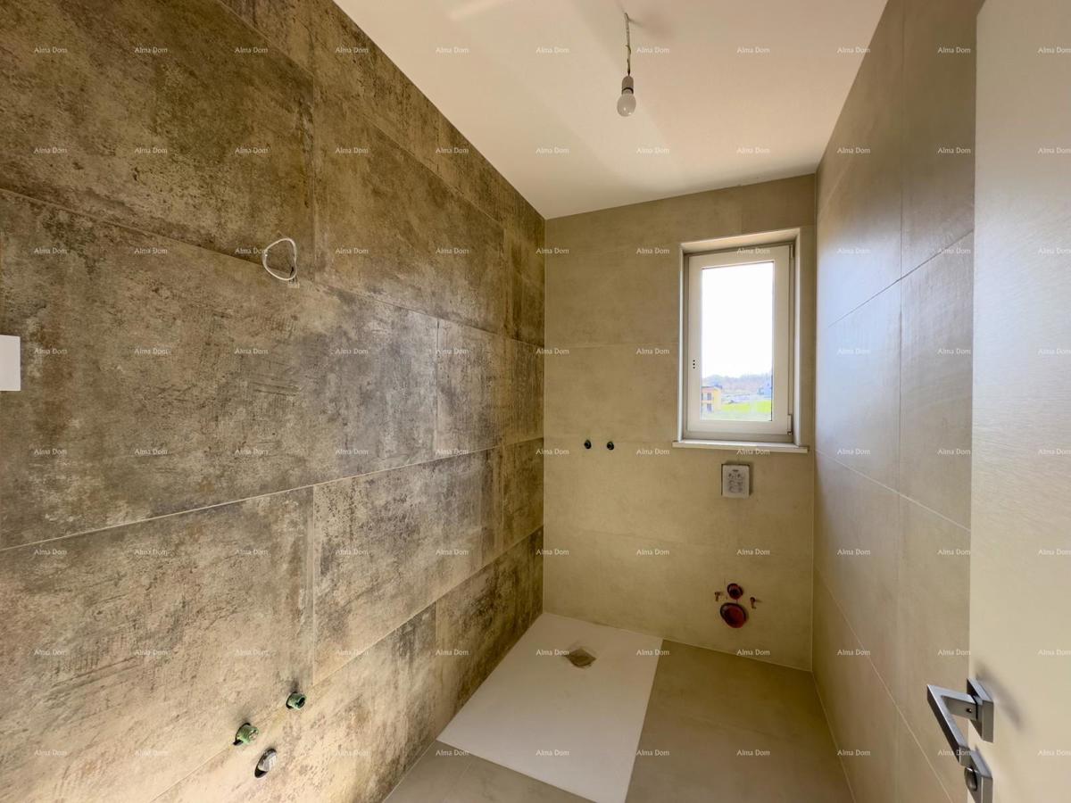 Vendiamo un appartamento con un grande giardino a Barban.