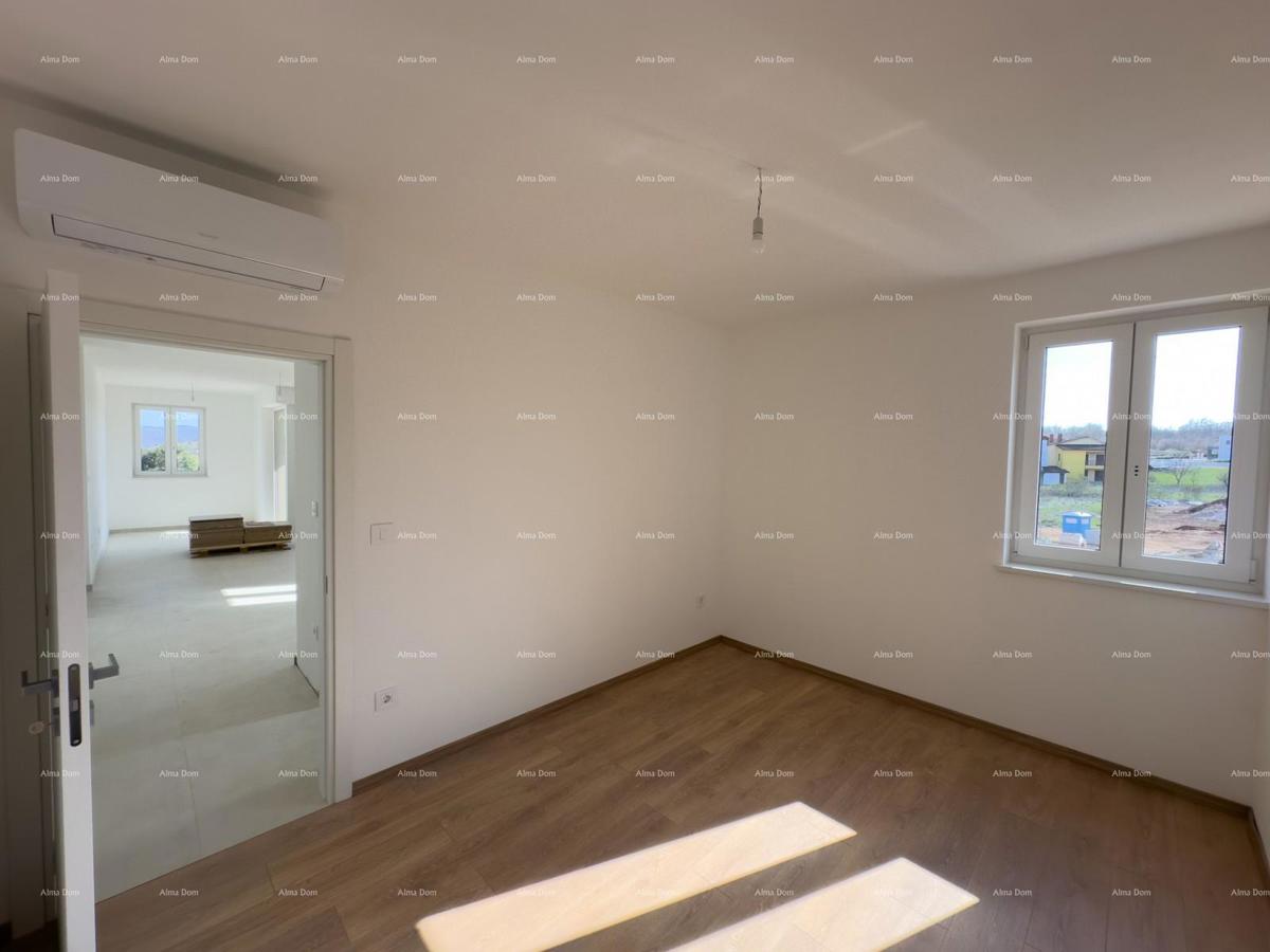 Vendiamo un appartamento con un grande giardino a Barban.