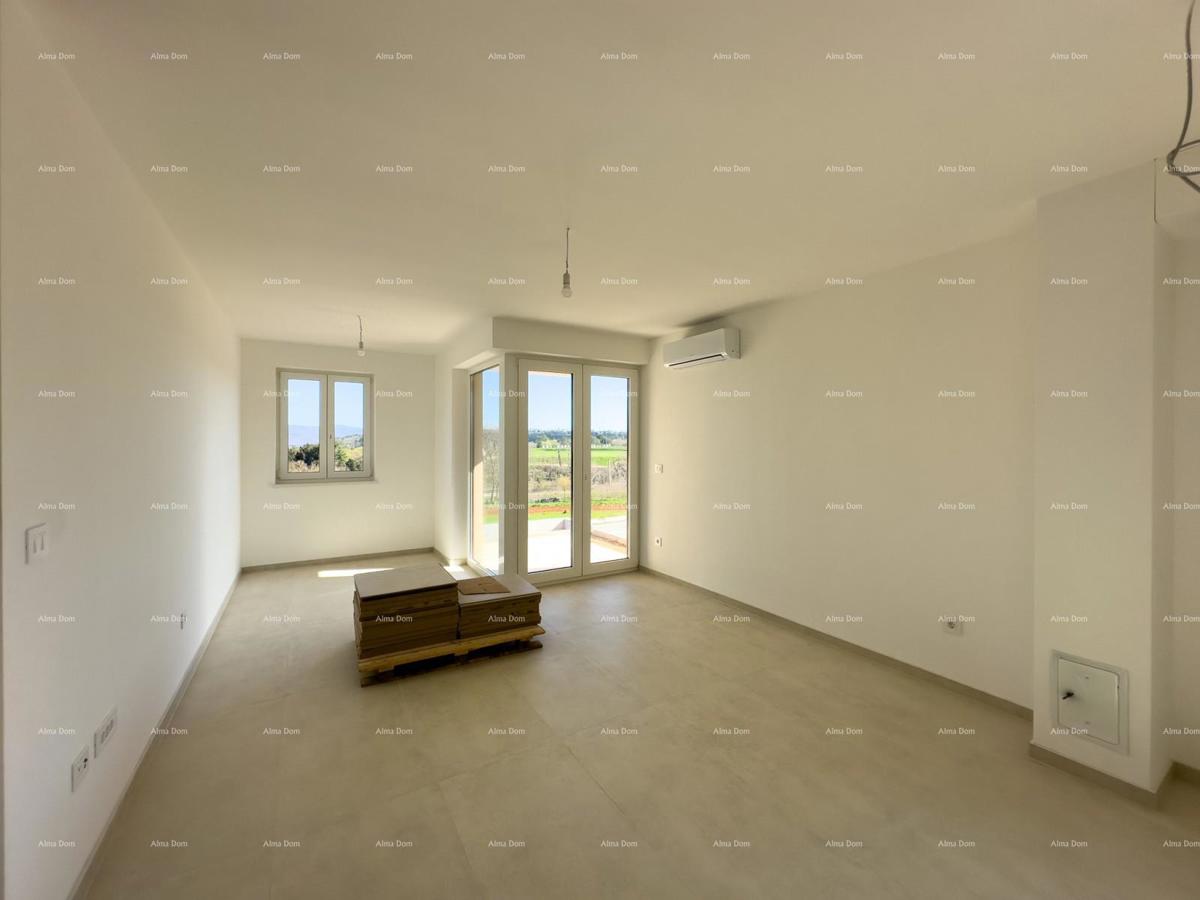 Vendiamo un appartamento con un grande giardino a Barban.