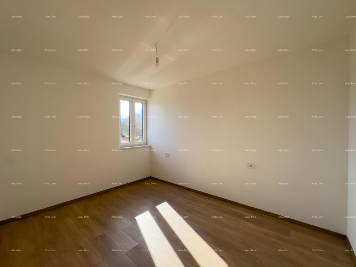 Vendiamo un appartamento con un grande giardino a Barban.