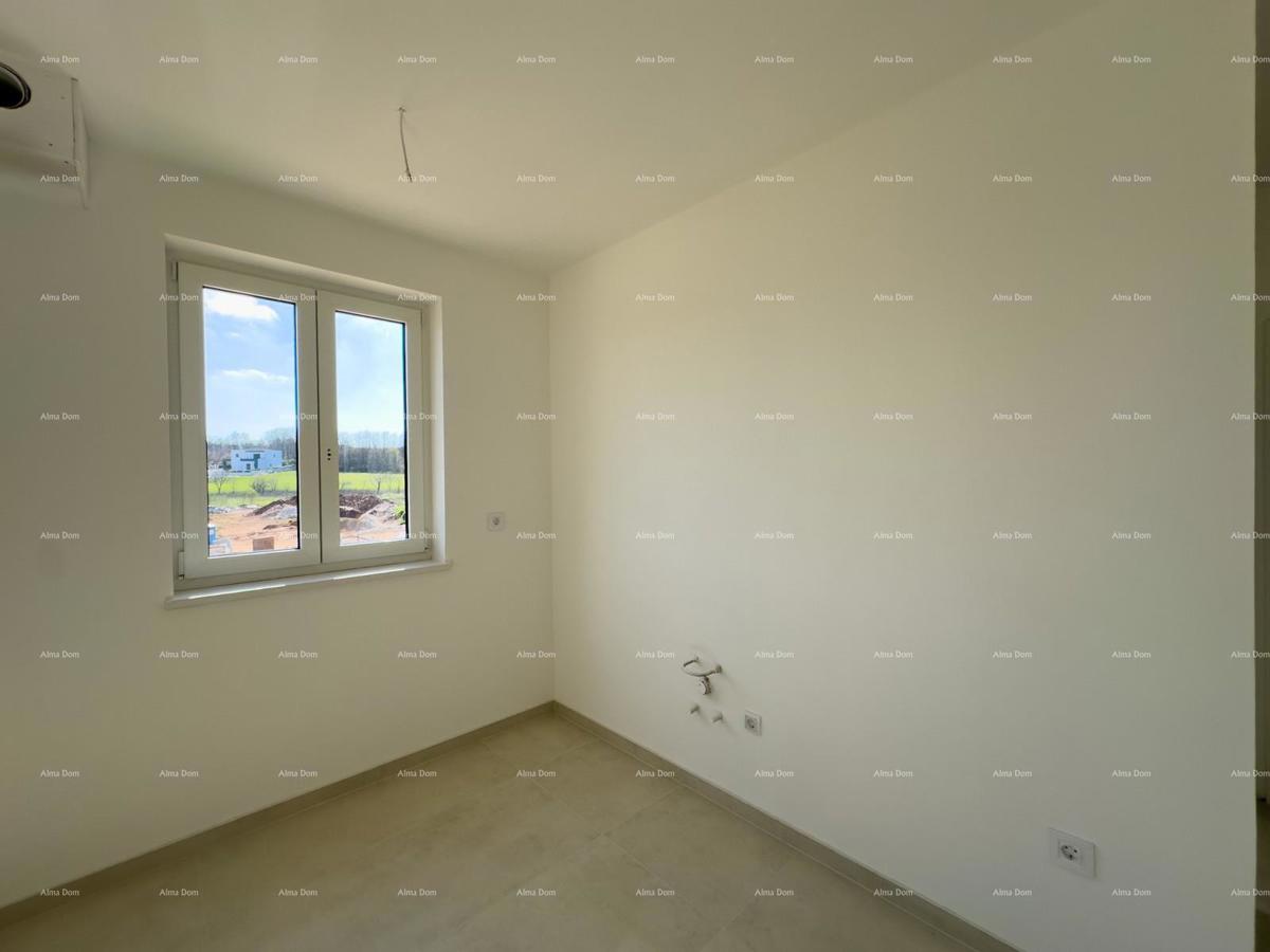 Vendiamo un appartamento con un grande giardino a Barban.