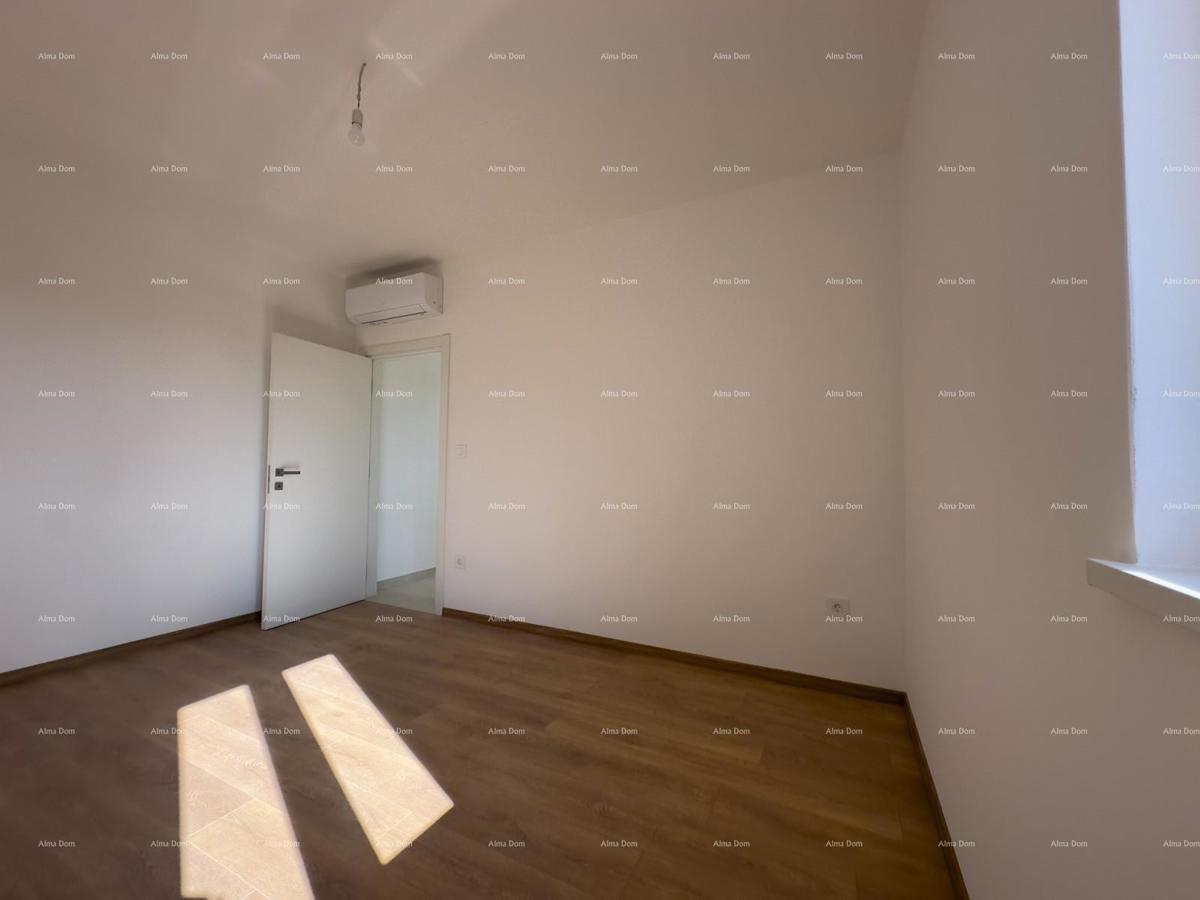 Vendiamo un appartamento con un grande giardino a Barban.