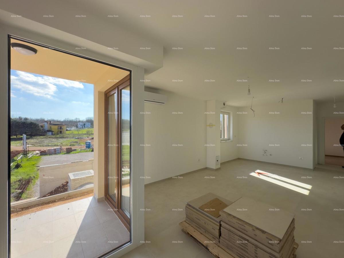 Vendiamo un appartamento con un grande giardino a Barban.