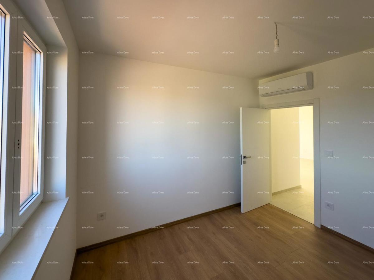 Vendiamo un appartamento con un grande giardino a Barban.