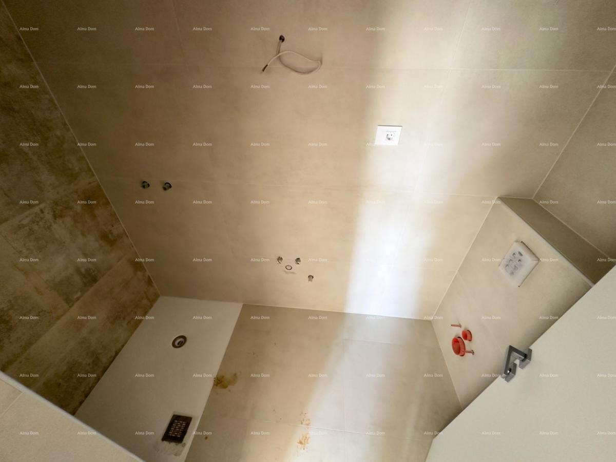 Vendiamo un appartamento con un grande giardino a Barban.